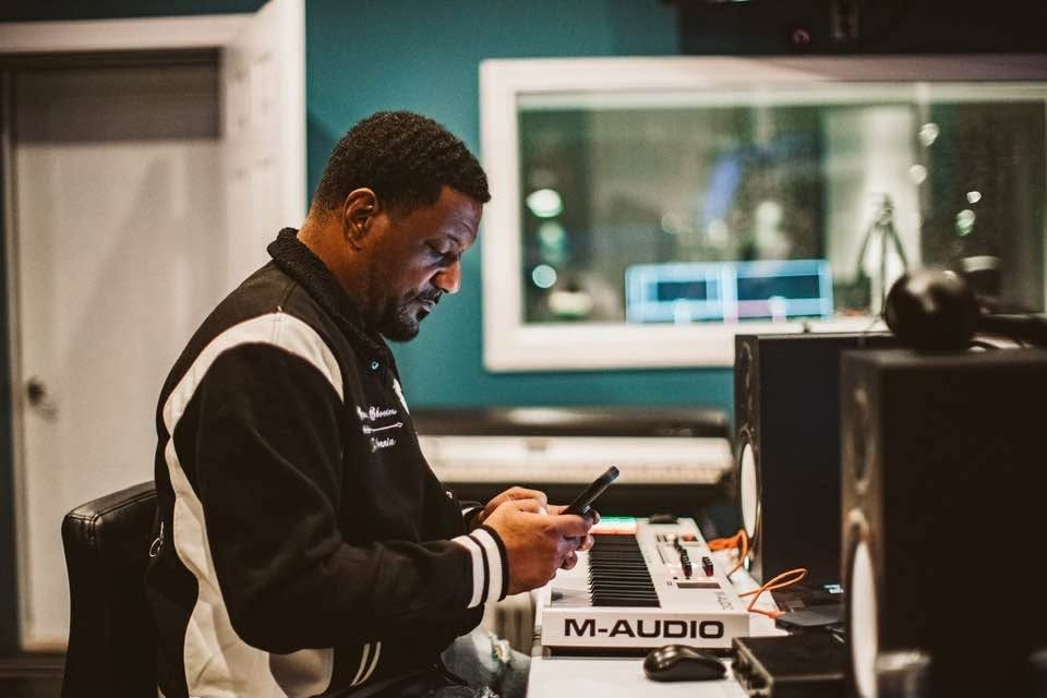 Keyz Bridgez at an M-Audio keyboard in the studio